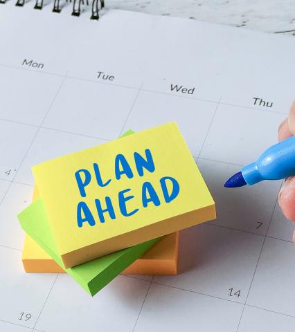 stack of sticky notes that say 'plan ahead' 